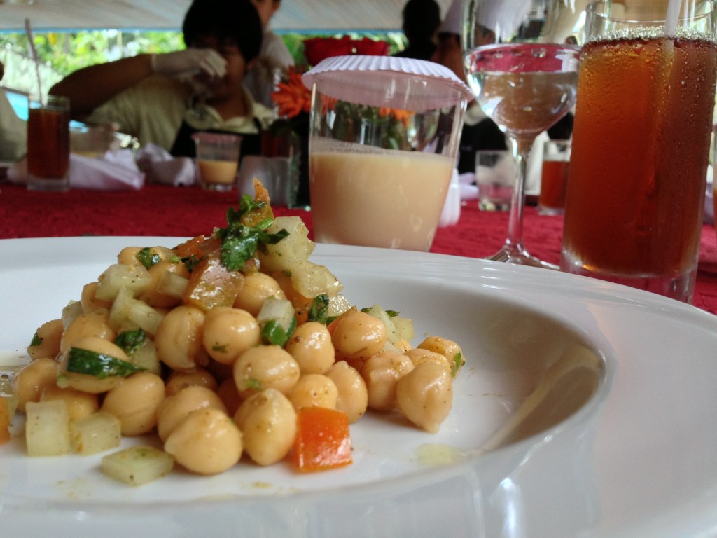Channa Chaat (I call it 'Chickpea Salad'). Supporting tasteries include chai and mango lassi.