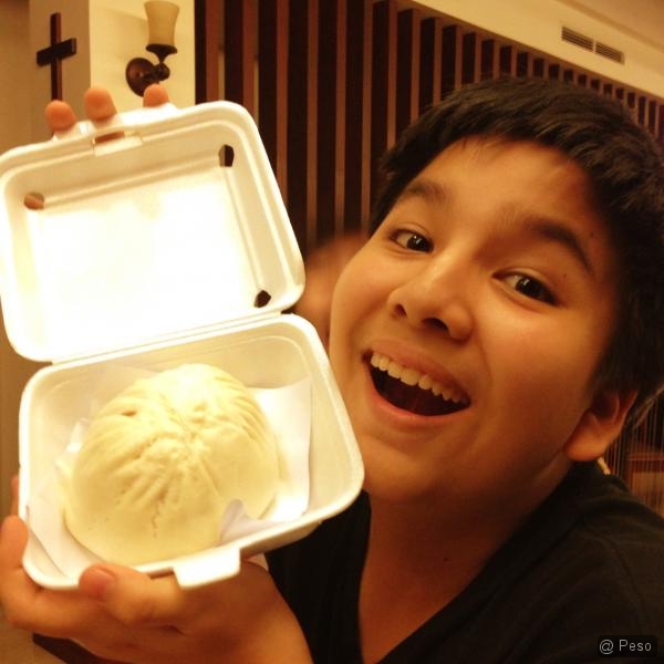 Cute boy with cute dumpling (not me).